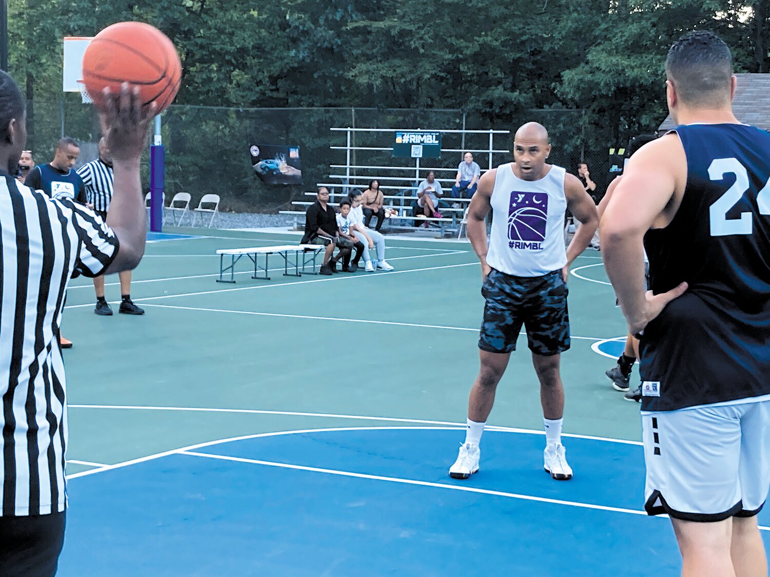 THE GAME’S MENTAL SIDE: East Providence firefighter Edson Evora, playing with the Rhode Island State Police team, prepares to shoot a free throw.